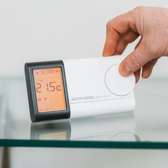 Navien Smart Plus Controller in hand image